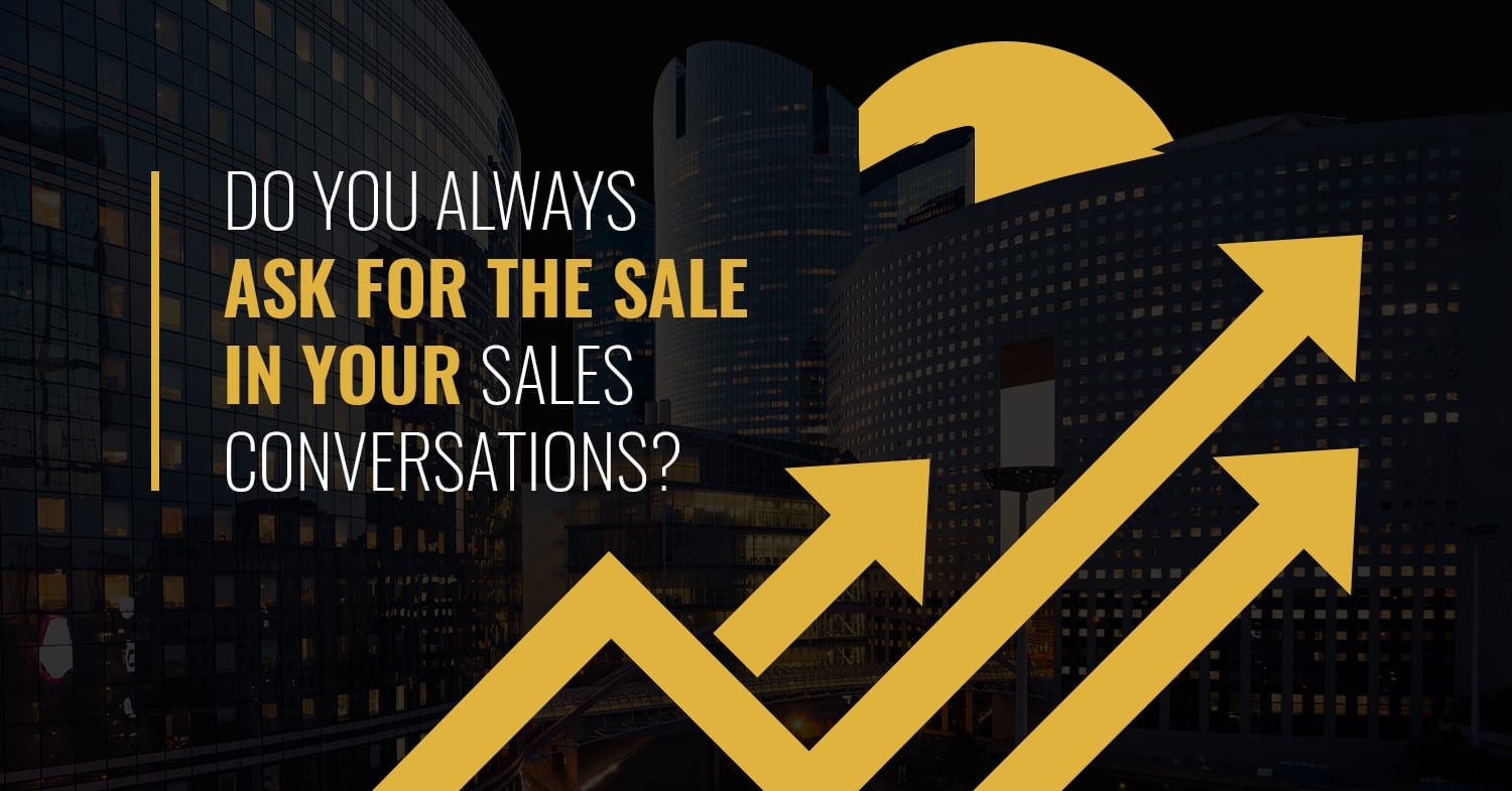 Tall buildings at sunrise with the sun coming up behind them arrows pointing to Do You Always Ask for the Sale in Your Sales Conversations in bold overlay