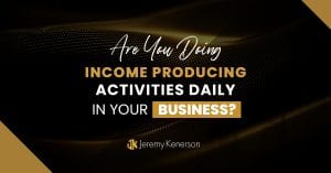 Black and gold background with Are you doing income producing activities daily in your business? in the middle