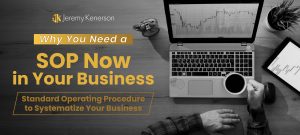 Entrepreneur sitting at desk looking at SOP on laptop with his coffee.