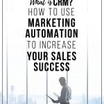 A man in a conference room at work looking at information about What is CRM and How to Use Marketing Automation to Increase Your Sales Success.